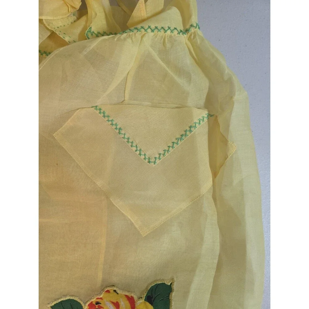 1950s Handmade Yellow Organza Apron Featuring Bold Orange Floral Appliqués